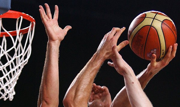 basketball with hands up