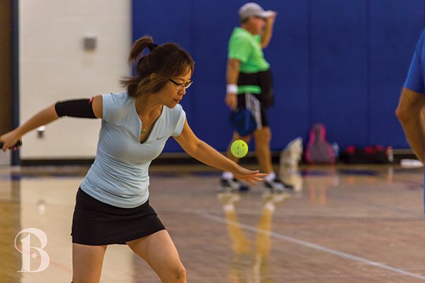 woman playing pickleball